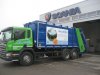Grüner Lkw von Scania mit Fahrzeugbeschriftung in München